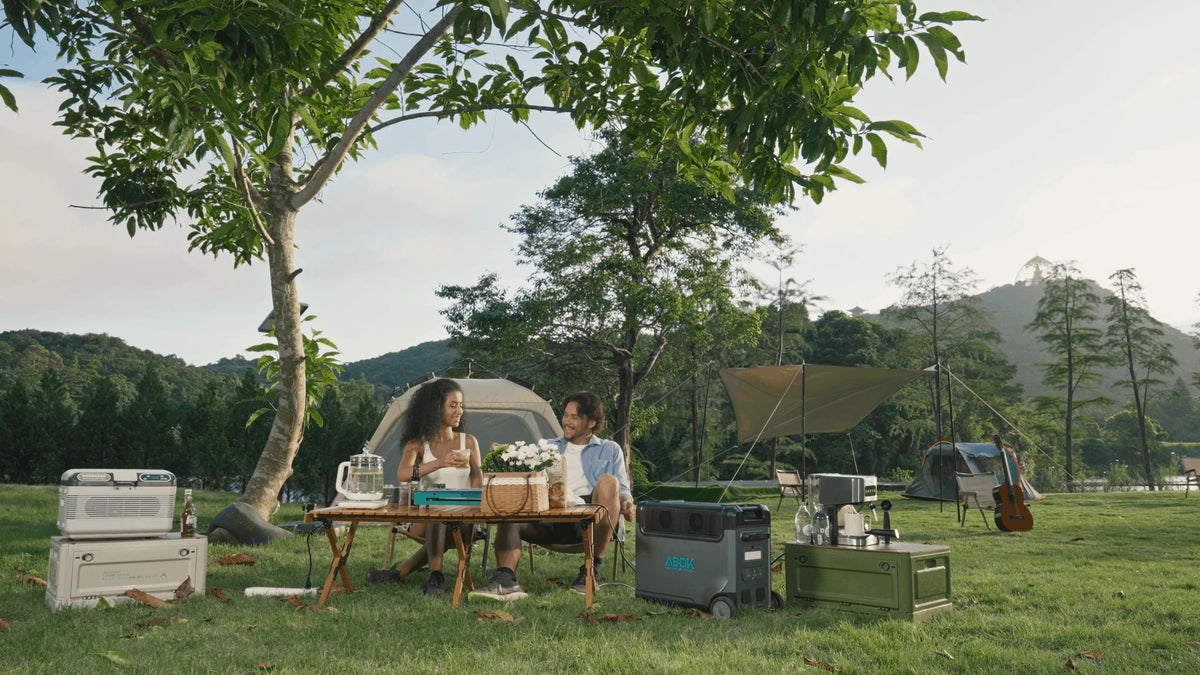 ABOK portable power station supplying energy at a family spring campsite.