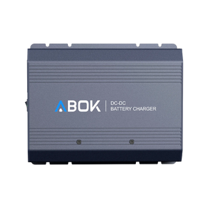 ABOK ACS500 DC-DC battery charger in a straight product view showing its ribbed aluminum housing and ABOK branding.