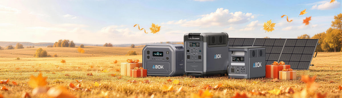 ABOK EU fall sale desktop banner showing EU-spec portable power stations and solar panels with gift boxes in an autumn field.
